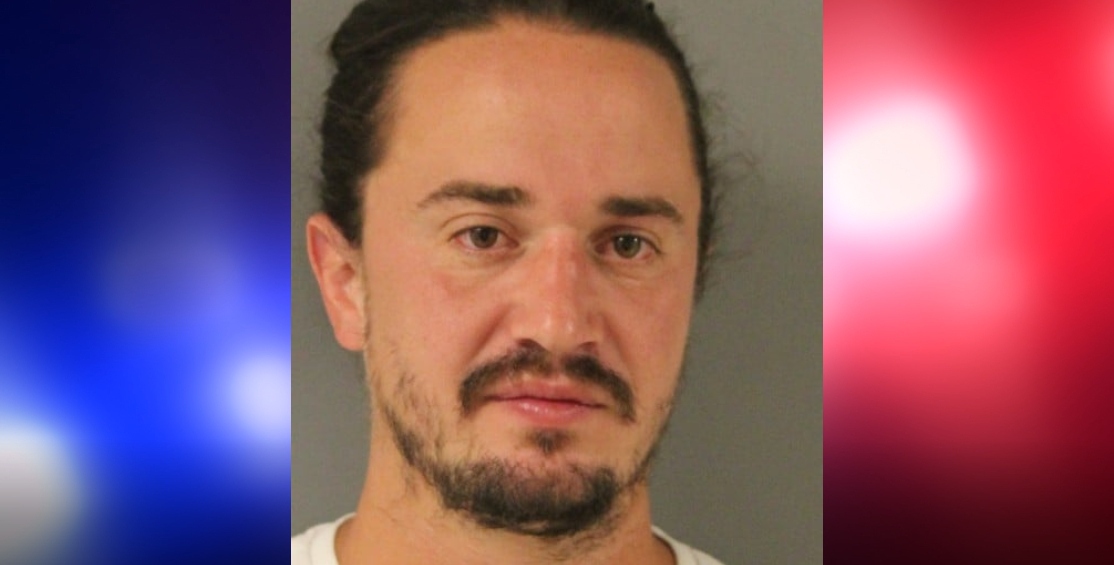 Dover man wanted on felony theft, forgery charges in Laurel