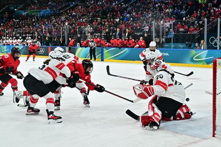 Canadian Hockey Star Sets New Olympic Scoring Record in Milan Games