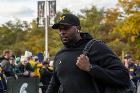 Former Michigan Football Coach Wins Court Challenge Over Arrest Warrant