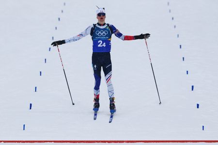 Soccer Legend Juergen Klopp Rings Victory Bell at Winter Olympics Biathlon