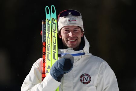 Norwegian Biathlete Caps Dramatic Olympics with Fifth Medal Despite Personal Turmoil