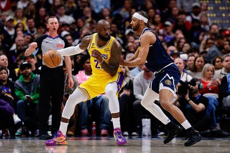 LeBron James Injures Elbow During Lakers’ Loss, Exits Historic Game Early