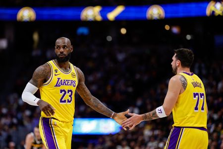 LeBron James Makes History But Exits Injured as Lakers Fall to Nuggets