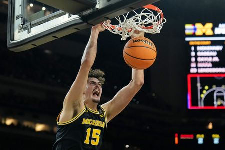 Wolverines Heavily Favored Over UConn in Monday’s Championship Showdown