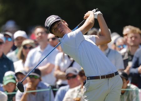 18-Year-Old Amateur Golfer Battles Nerves, Flying Hat in Masters Debut