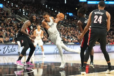 Spurs Star Wembanyama Sidelined with Concussion in Playoff Game Against Blazers