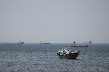 Major Shipping Companies Halt Gulf Operations Amid Strait of Hormuz Crisis