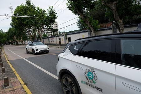 China Halts Self-Driving Car Permits After Robotaxi System Failure