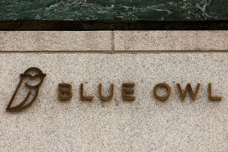 Blue Owl Capital Fund Secures $500M Bond Sale Amid Investor Withdrawal Limits