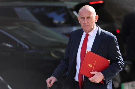 British Defense Minister Steps Down Over Military Spending Dispute