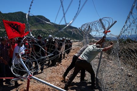 Albanian Villagers Destroy Resort Fences in Land Rights Protest