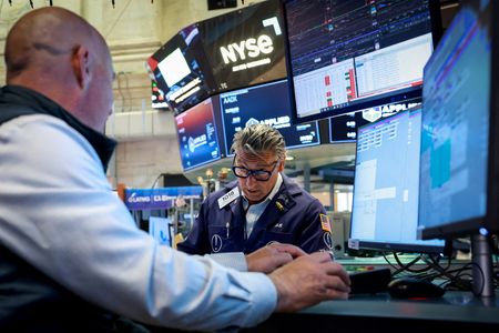 Wall Street Mixed Tuesday as Tech Stumbles, Dow Sets New Record