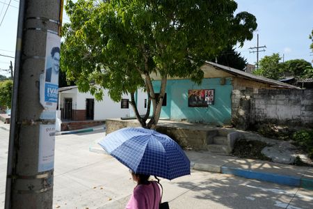 Side-by-Side Colombian Towns Divided Over Opposing Presidential Candidates