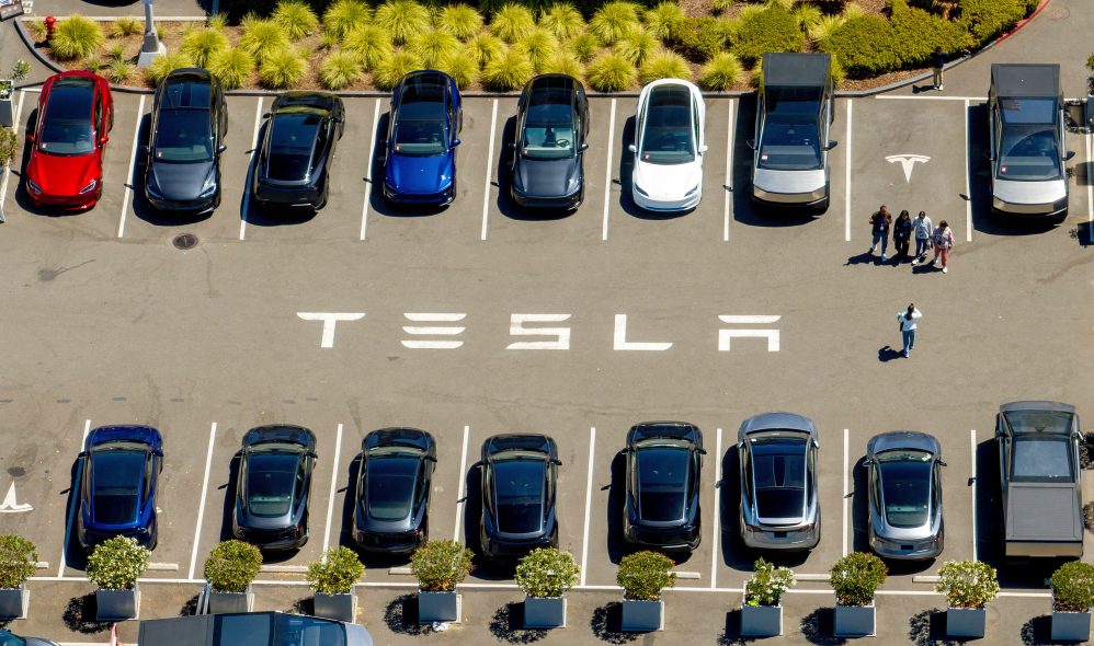 Federal Investigators Launch Probe After Tesla Crashes Into Texas Home, Killing Woman