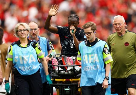 Qatar’s Madibo Visits Canada’s Kone in Hospital After World Cup Injury