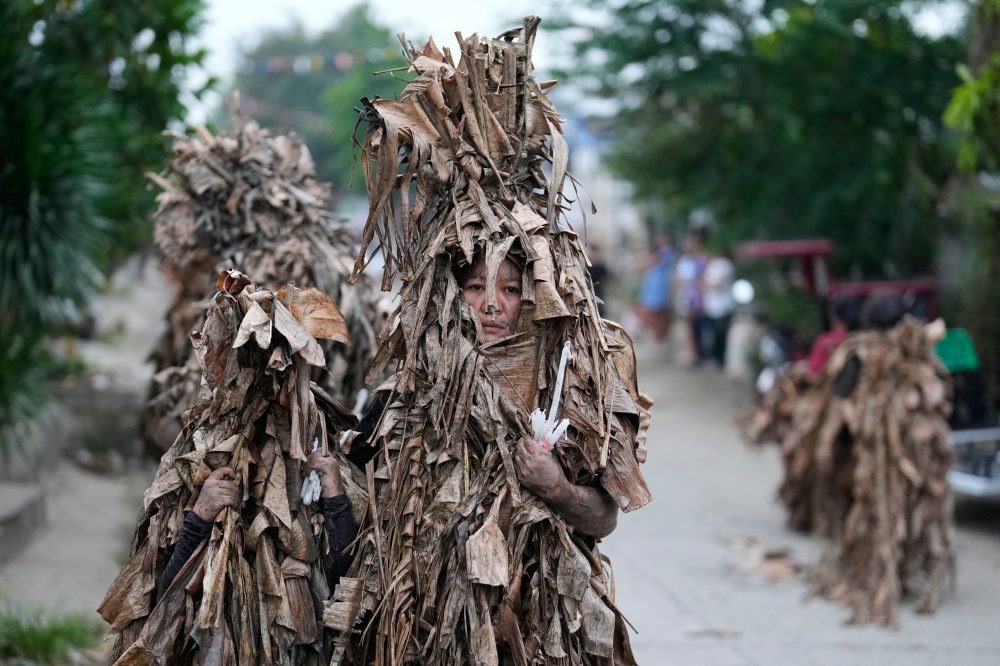 Mud-Covered Faithful Honor St. John the Baptist in Philippine Village Festival