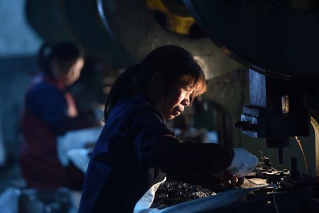 China’s Factory Output Barely Grows in June as Economy Fights for Momentum