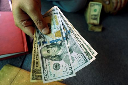 U.S. Dollar Holds Near Two-Week Low as Fed Rate Hike Hopes Fade