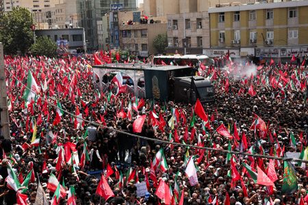 Thousands March in Tehran, Vowing Revenge on Trump at Khamenei Funeral