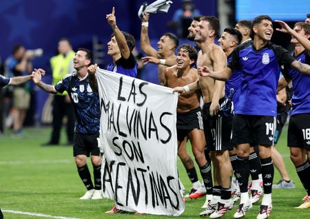 Argentine Players Flash Falklands Political Banner After World Cup Win Over England