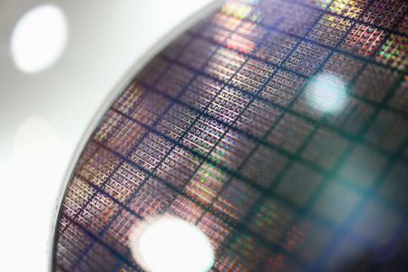 UK Chipmaker IQE Boosts Revenue Forecast on AI and Data Centre Demand