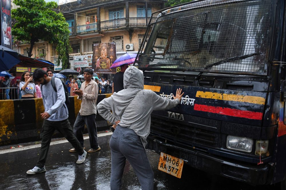 One Woman’s Stand: The Photo That Defined India’s ‘Cockroach’ Protests