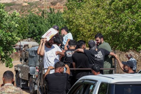 Lebanese Residents Return to Devastated Town After Israeli Forces Pull Back
