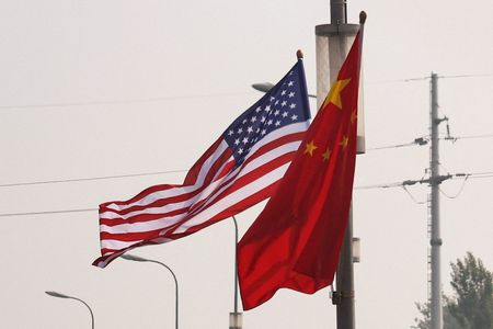FBI Director and China’s Police Chief Pledge Stronger Law Enforcement Ties
