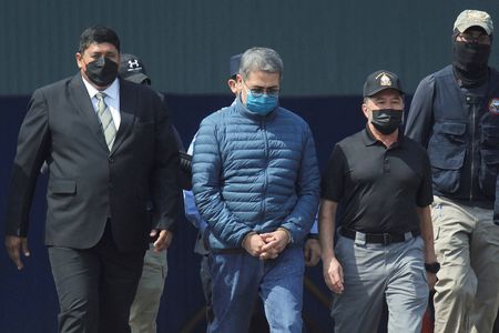 Pardoned Ex-Honduras President Heads Home, Faces New Legal Battle