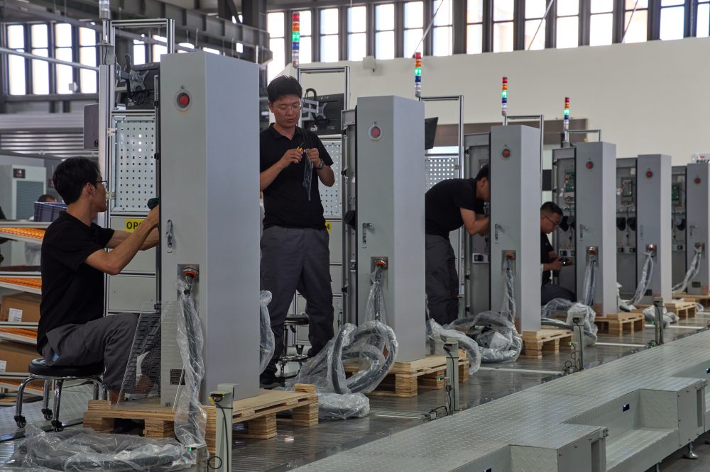 China Defends Industrial Output as U.S. Tariff Probe Results Loom